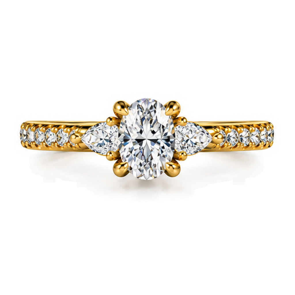 Oval moissanite three-stone engagement ring with pear side stones and pavé band, top view