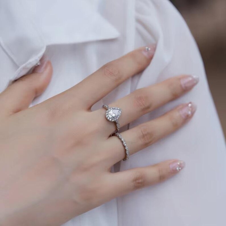 Bridal Ring Set — Pear Shape Moissanite, White Gold Finish, 925 Sterling Silver (2-Piece)