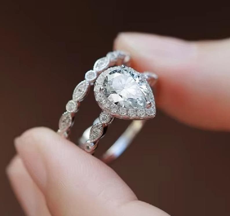 Bridal Ring Set — Pear Shape Moissanite, White Gold Finish, 925 Sterling Silver (2-Piece)
