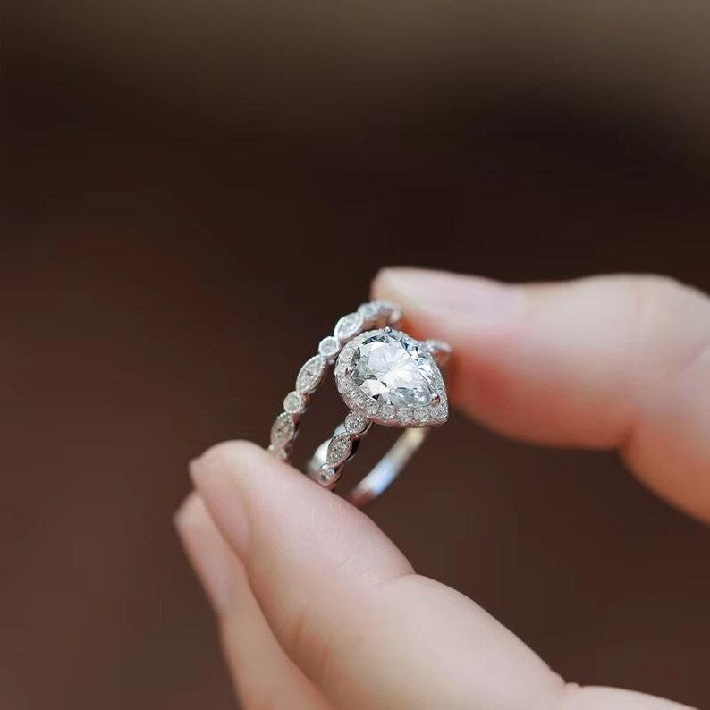 Bridal Ring Set — Pear Shape Moissanite, White Gold Finish, 925 Sterling Silver (2-Piece)