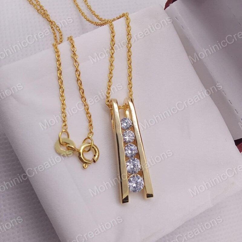 Moissanite 5-Stone Pendant, 14k Yellow Gold Plated Sterling Silver