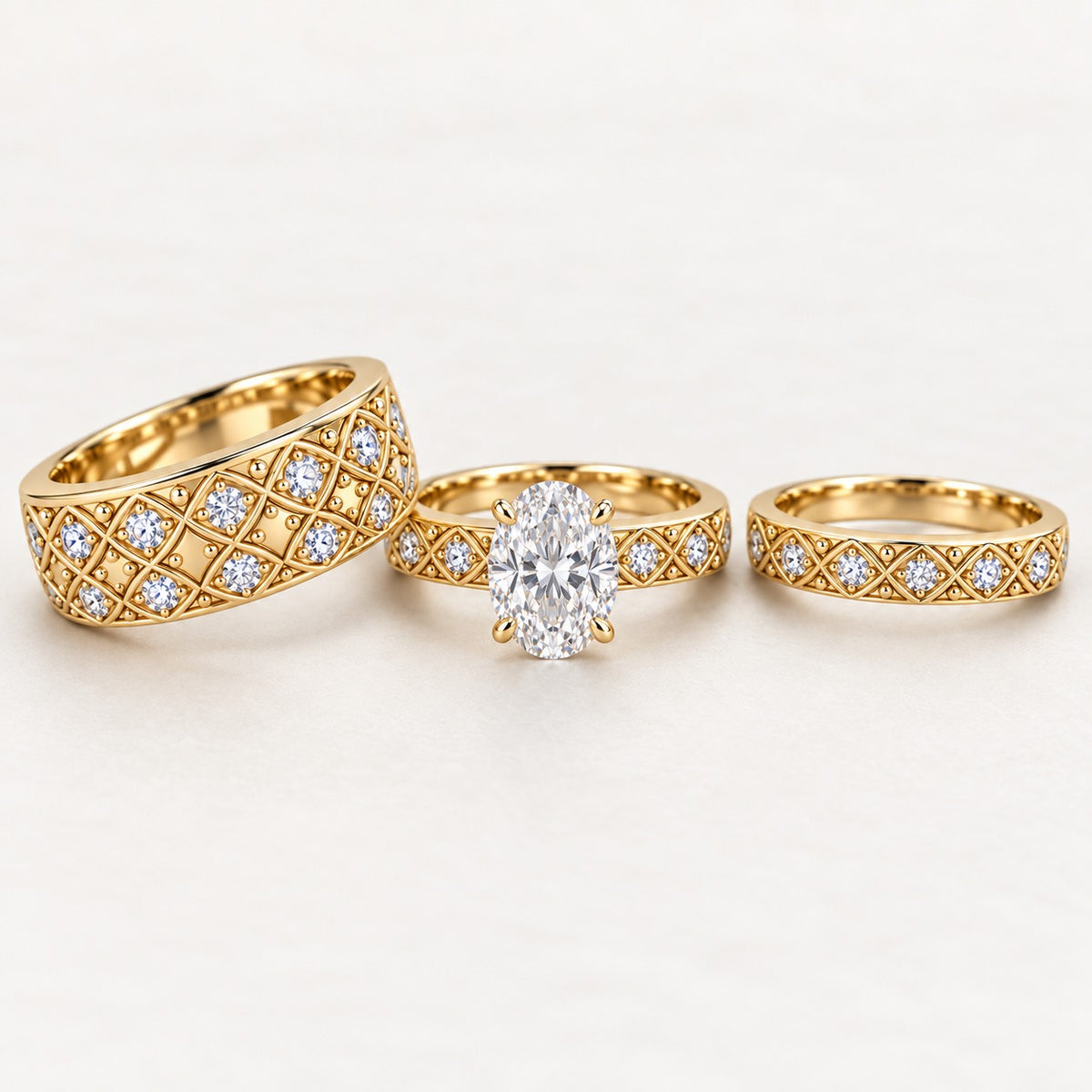 Oval Solitaire His & Her Trio Ring Set with Lattice Cross Pattern Bands